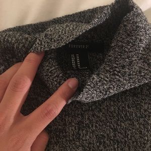 Sleeveless grey mock neck sweater